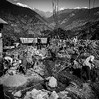 Szymon Barylski  -  Men rebuilding houses destroyed by the earthquake of April 2015. Mandre, Gorkha District, near the epicentre