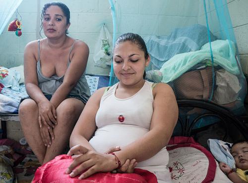 John Sevigny - Two women and a baby in a cell at the Ilopango prison for women in San Salvador. 